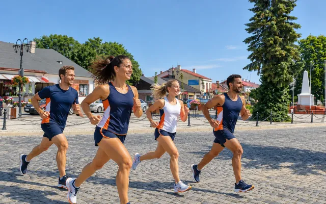 Running illustration for Kraśnik: adult runners in a destination setting; not the featured race edition or its course.