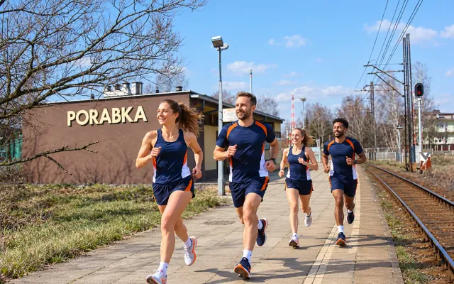 Running illustration for Sosnowiec: adult runners in a destination setting; not the featured race edition or its course.