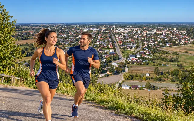 Running illustration for Włodawa: adult runners in a destination setting; not the featured race edition or its course.