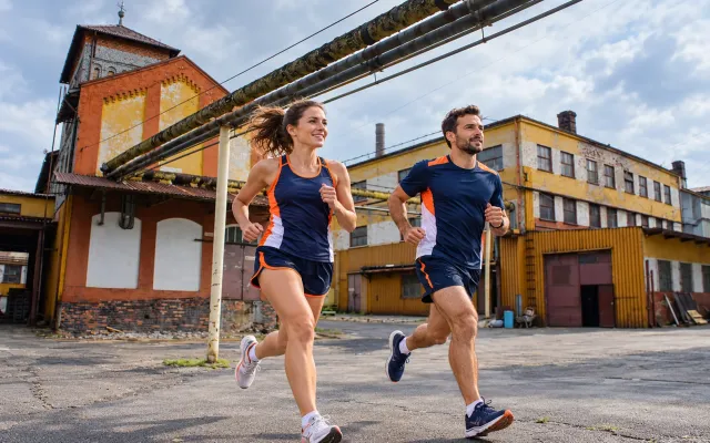 Running illustration for Zawiercie: adult runners in a destination setting; not the featured race edition or its course.